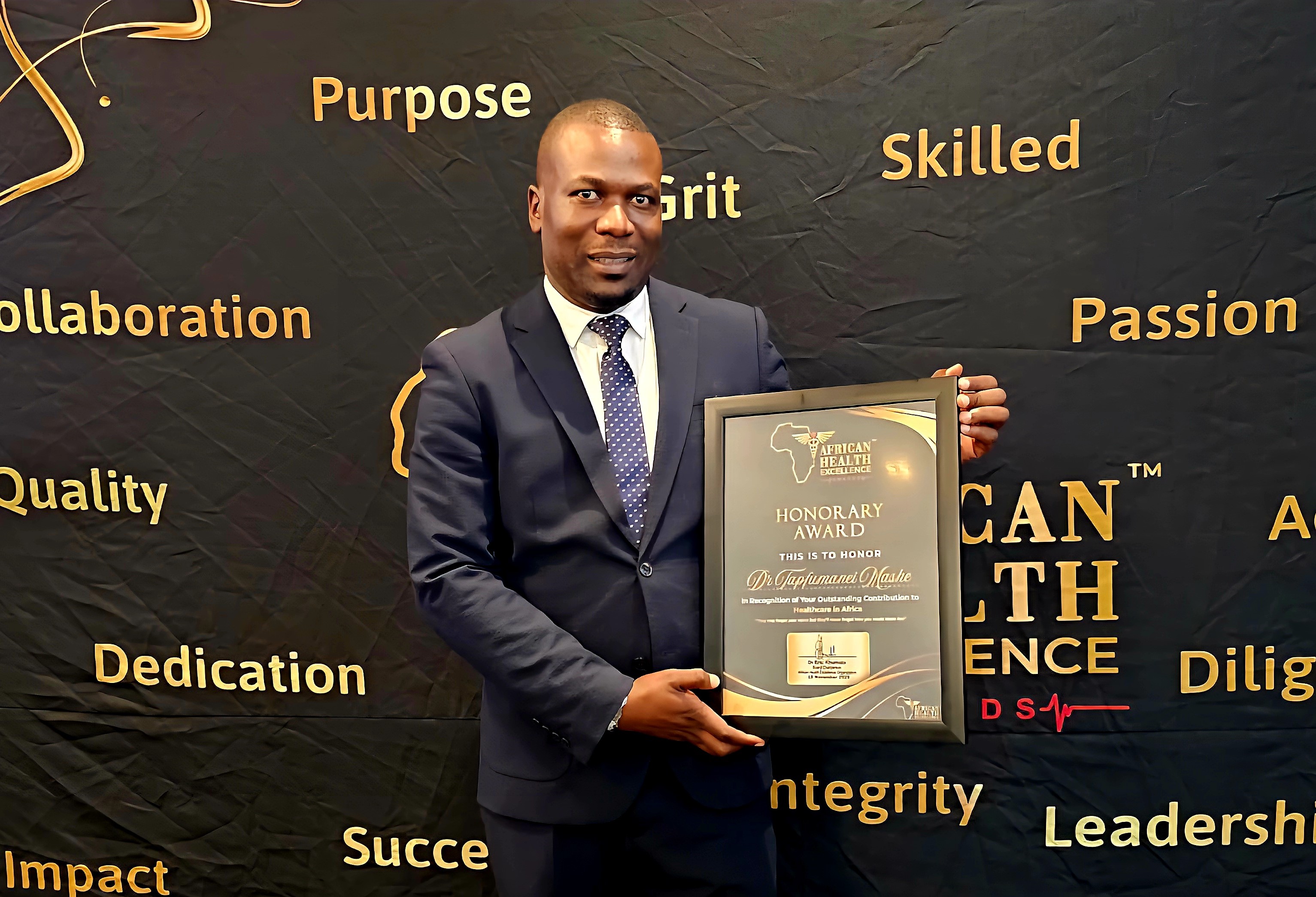 Tapfumanei Mashe with award